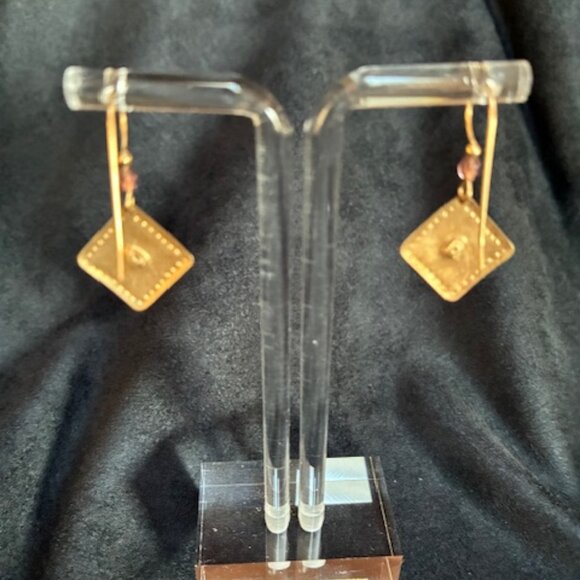 Dangling gold tone earrings with pink and green flowers. - Picture 2 of 4